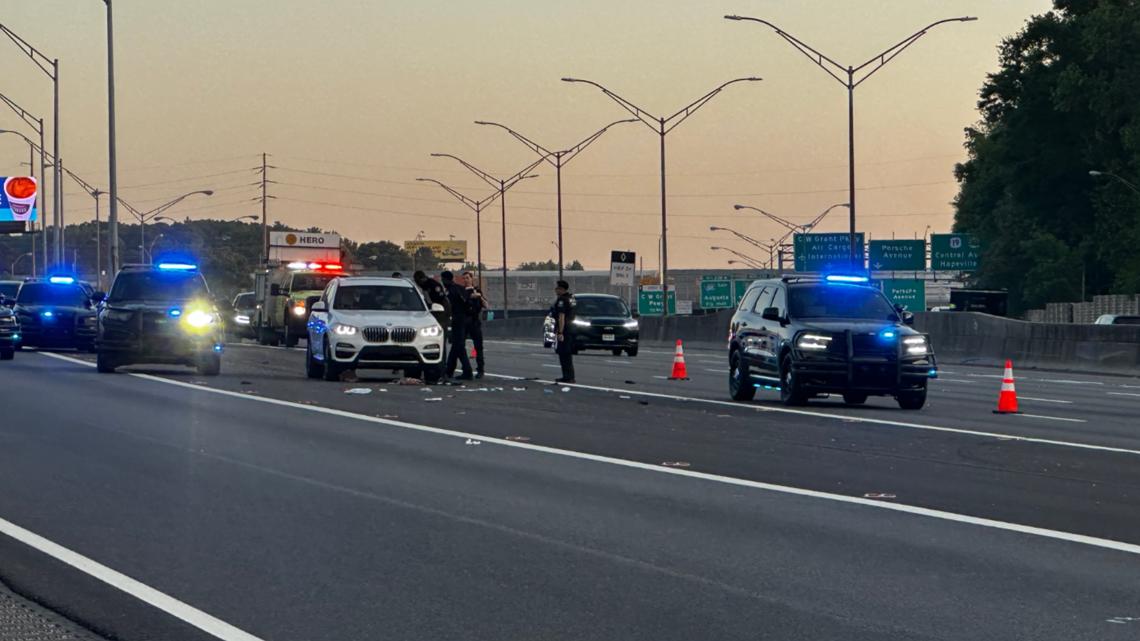 Multiple lanes of I-75 closed next to Atlanta airport after woman shot, killed