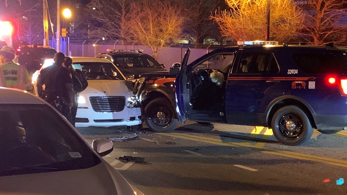 Police: Woman crashes into police car, charged with DUI | 11alive.com