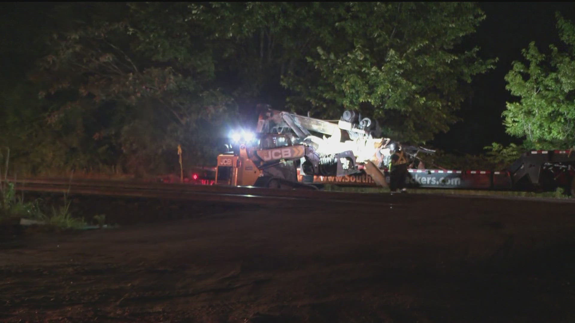 Crews work to clear debris after train hit truck in Union City ...