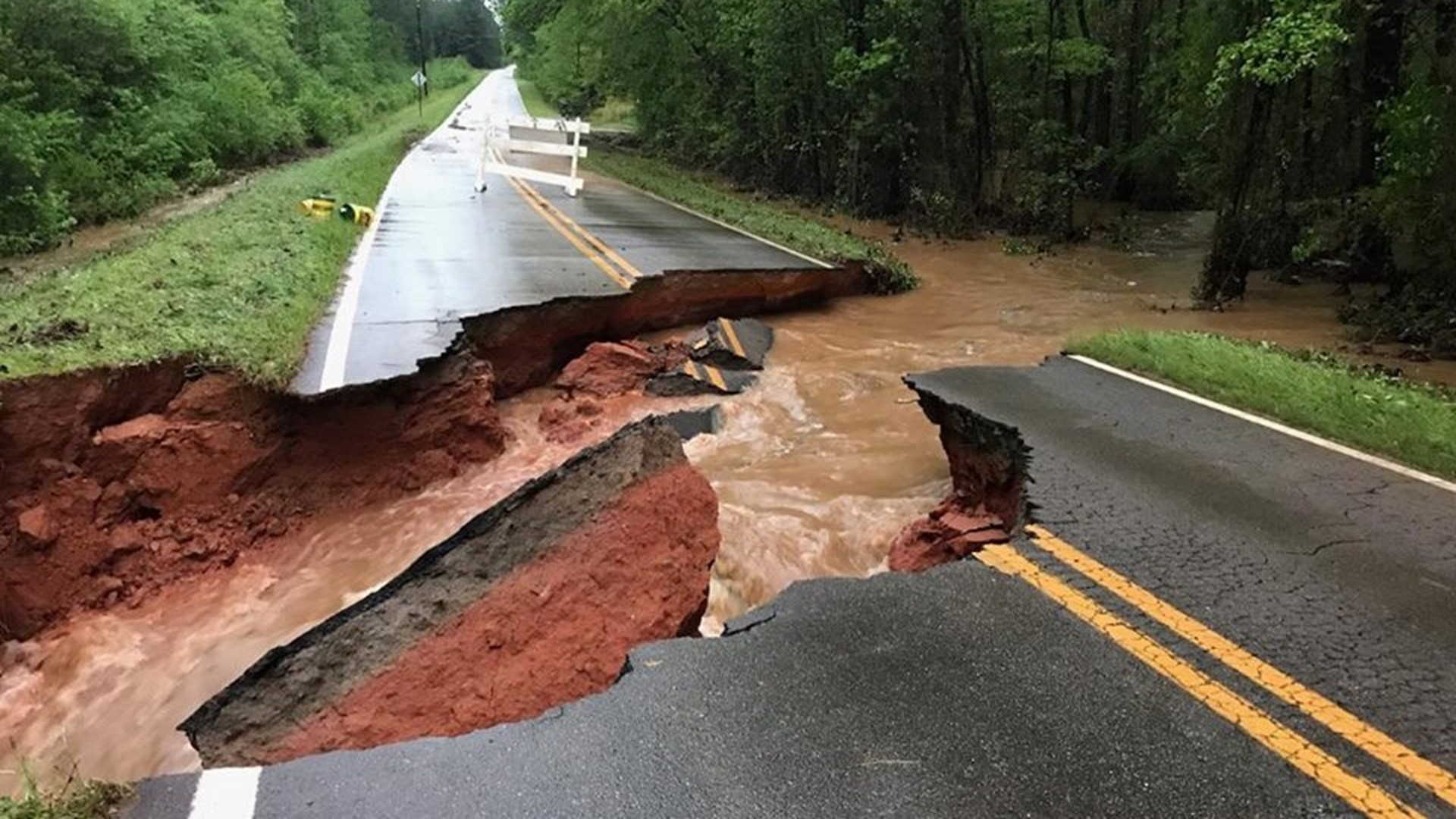 Severe flooding washes away Conyers driveway, shuts down roadways