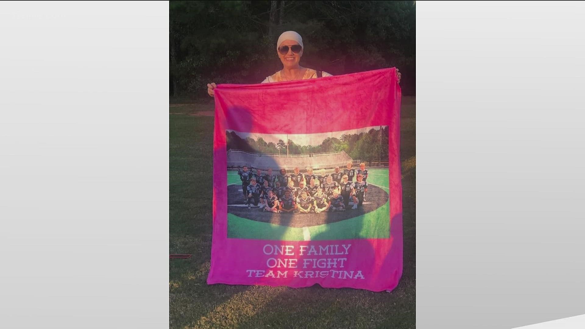 The East Paulding Raiders wanted to show their love and support by raising their own money to buy her a blanket with the team on the front.