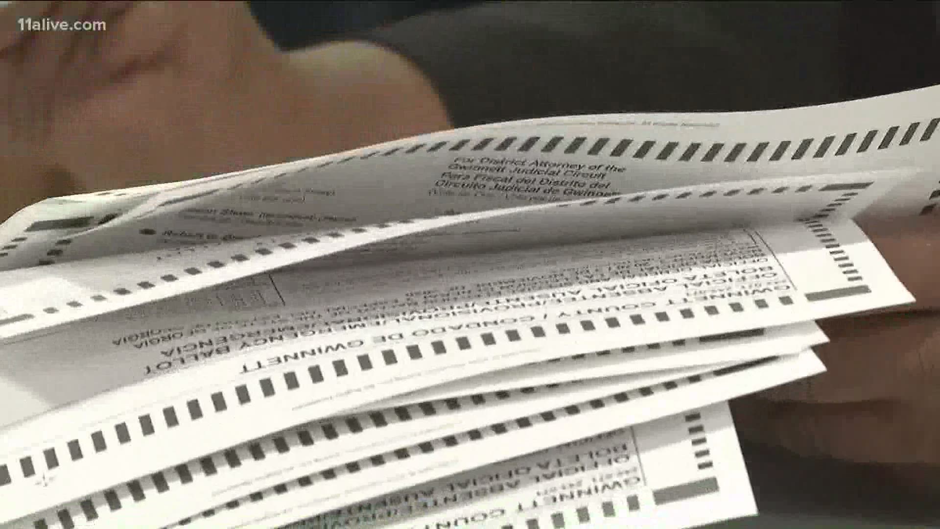 Some of Georgia's counties have already started to process absentee ballots from the Senate runoff election.