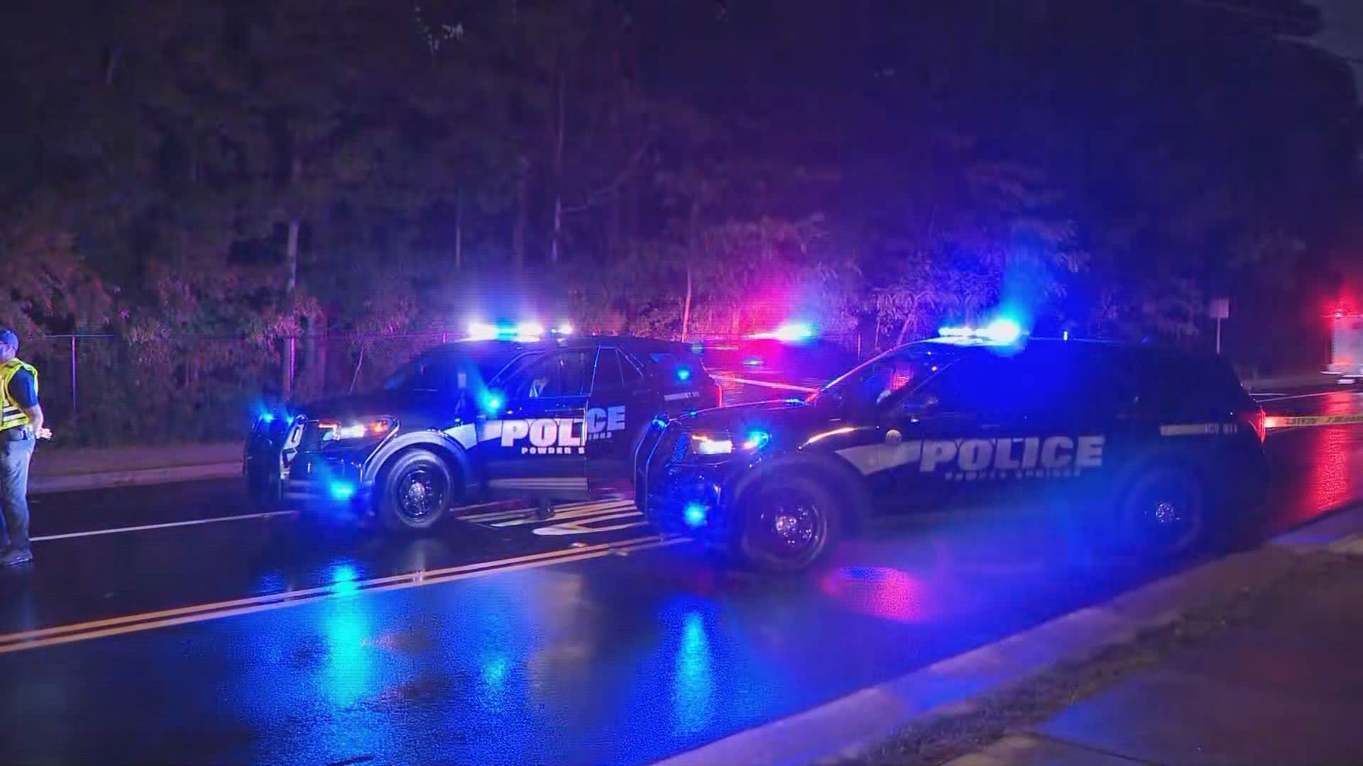 A Paulding County deputy and another person have been shot Saturday night, and a suspect is now barricaded inside of a home.