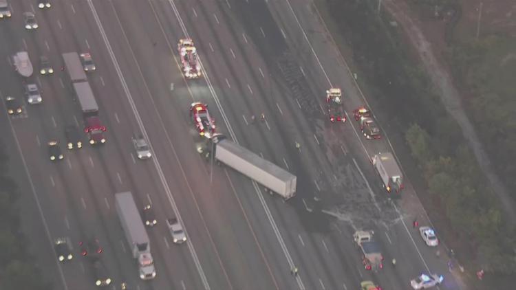 Lanes reopen after wreck involving multiple tractor trailers, fuel spill shuts down I-85 in Gwinnett