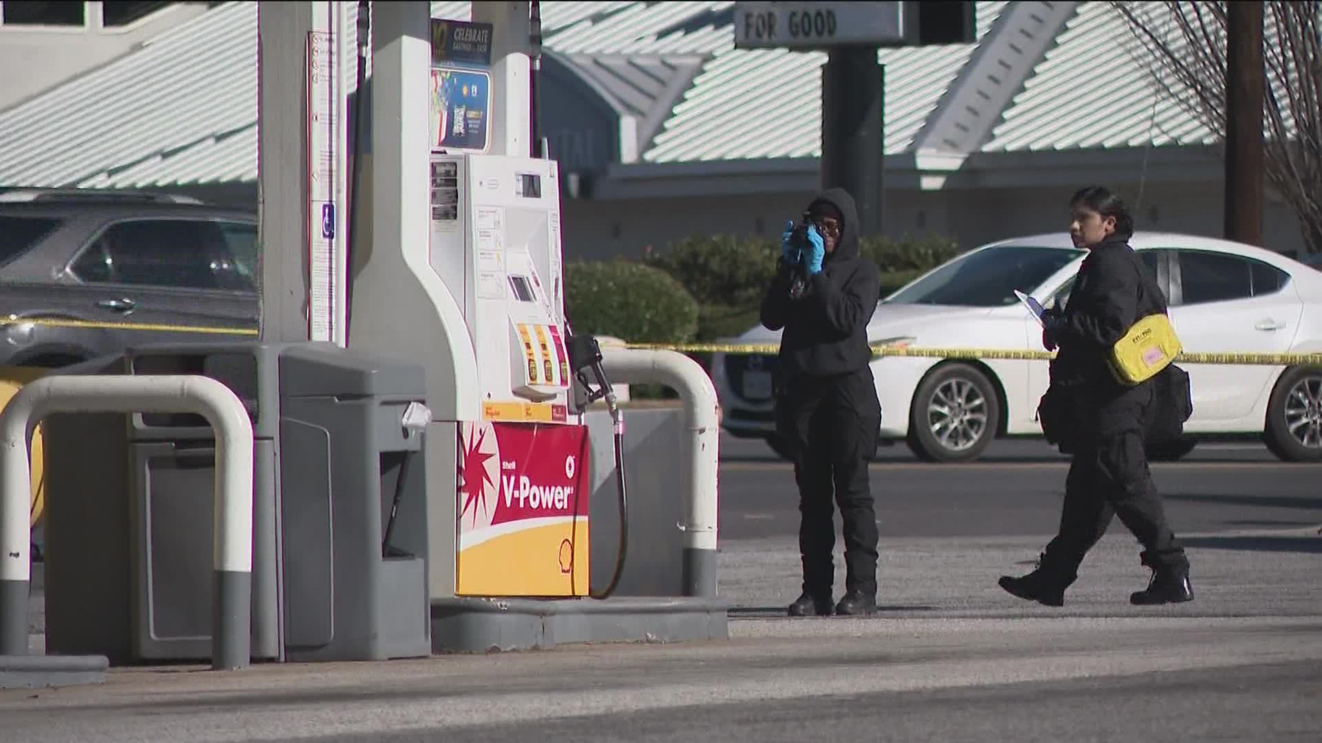 It happened at a Shell gas station on Flat Shoals Road shortly before 1 p.m.