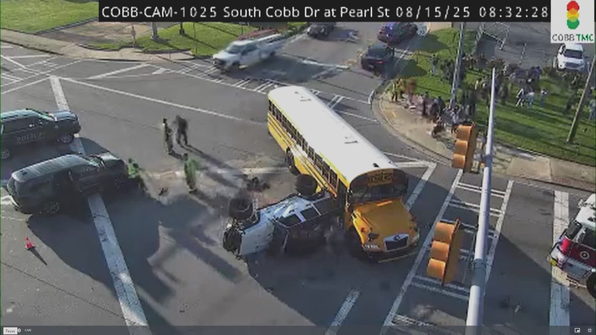 Traffic remains backed up at South Cobb Drive and Pearl Street after a crash involving a school bus and multiple vehicles.
