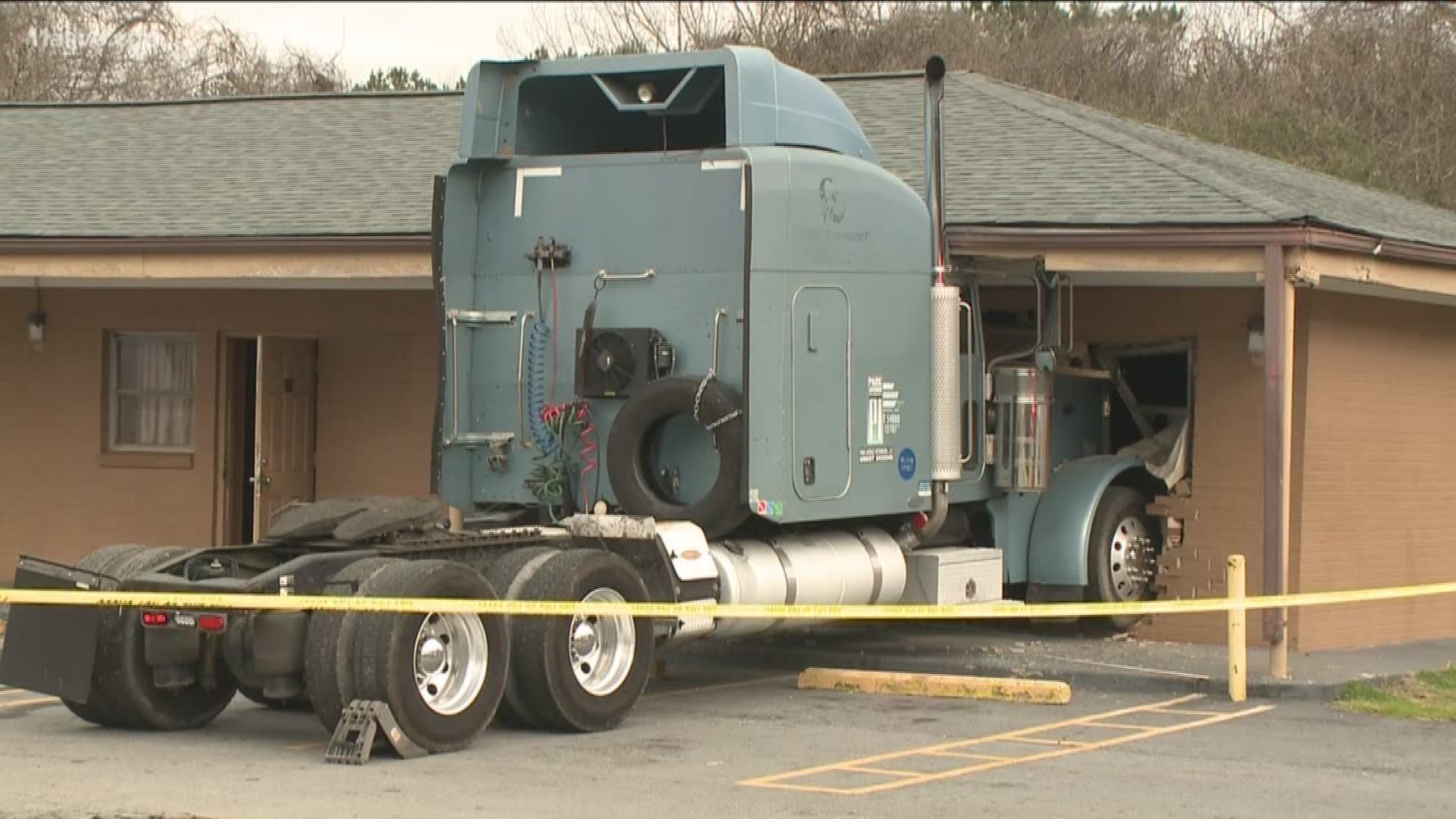 Police said it was after 9 a.m. when officers were dispatched to the accident. When they got there, the found the truck lodged in the side of the motel