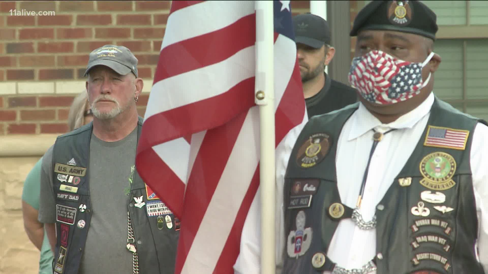 The Georgia National Guard provided salutes by air in two parts of the state, while other memorials looked different, with some wearing masks and social distancing.