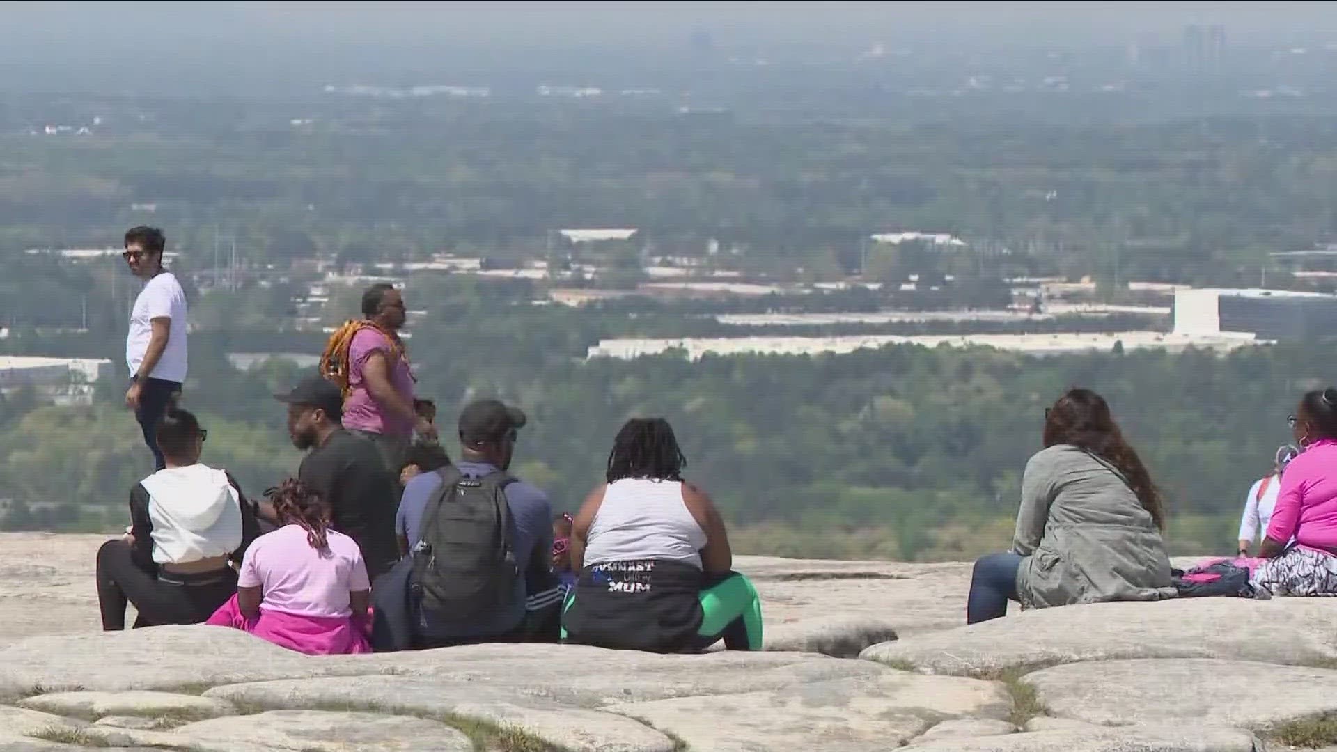 Hundreds of people flocked to the mountain top to watch the eclipse Monday.