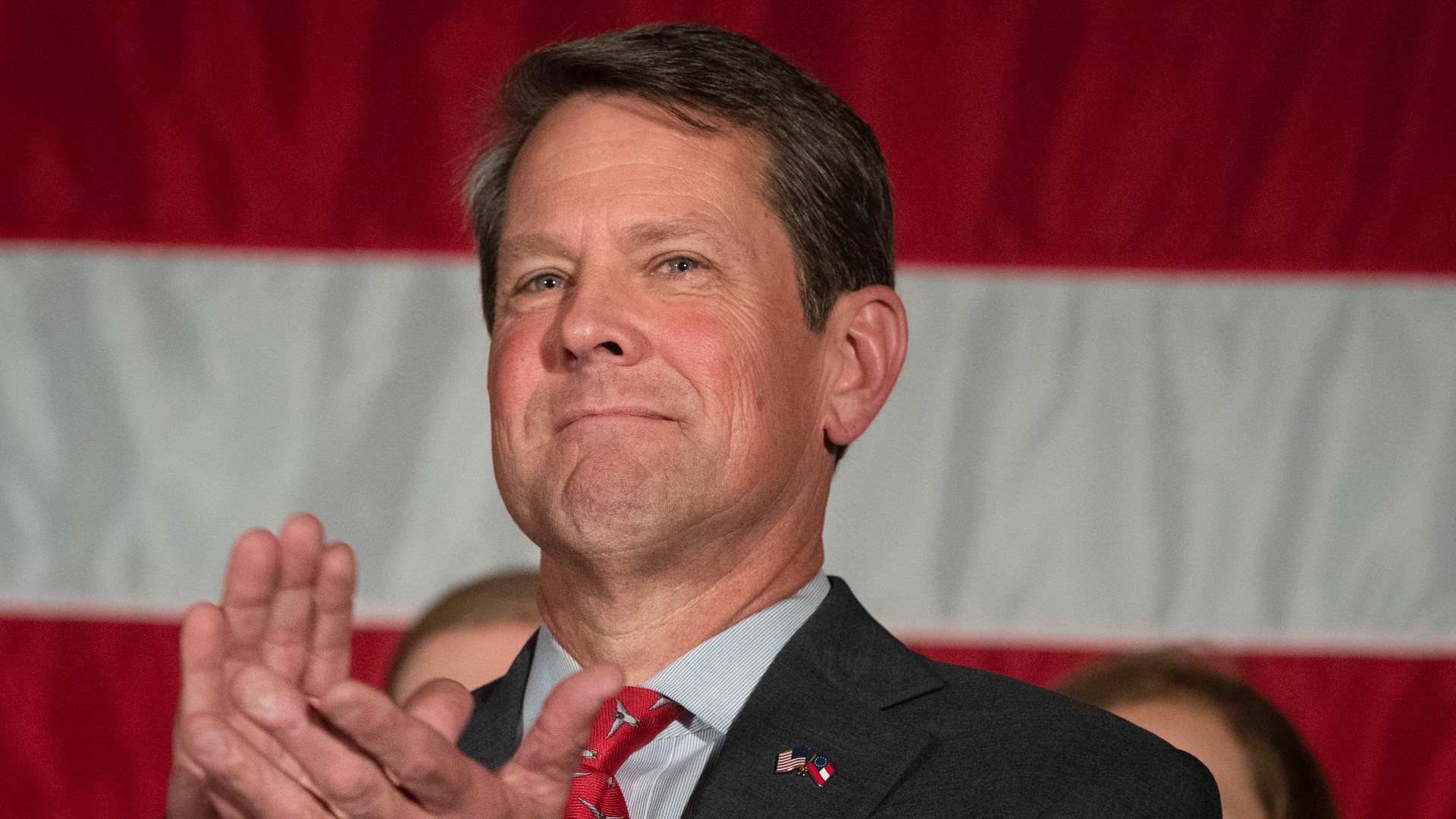 Gov. Brian Kemp is calling on Georgians to wear red and black in support of the Bulldogs on Monday.