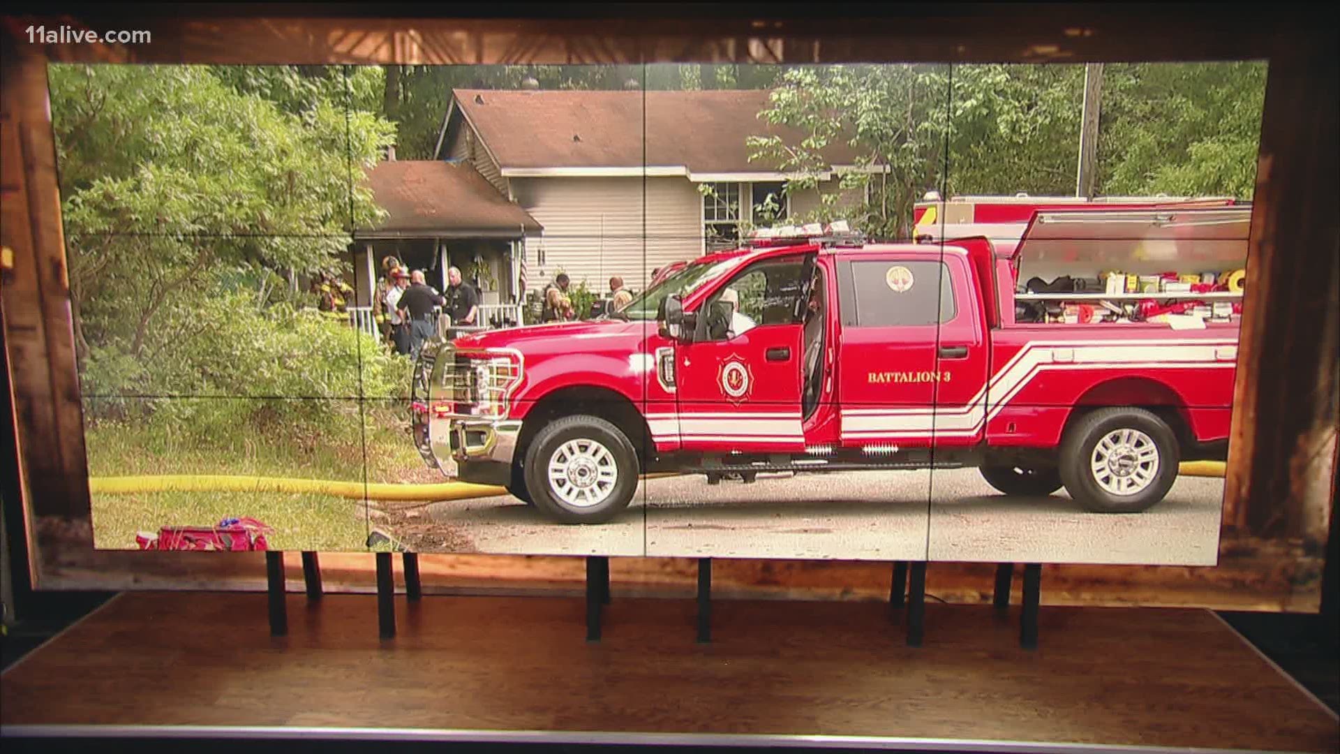 Three people have been taken to the hospital after a house fire in Cobb County.