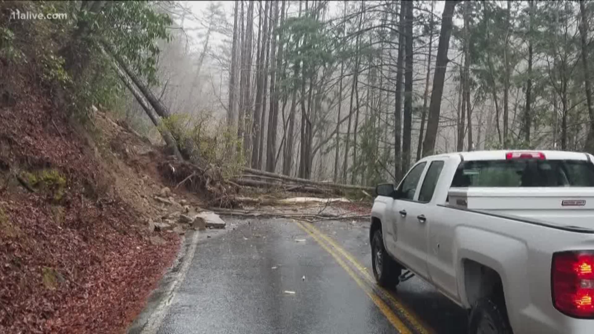 The landslide shut off a main road to the falls as heavy rains slam much of north Georgia.