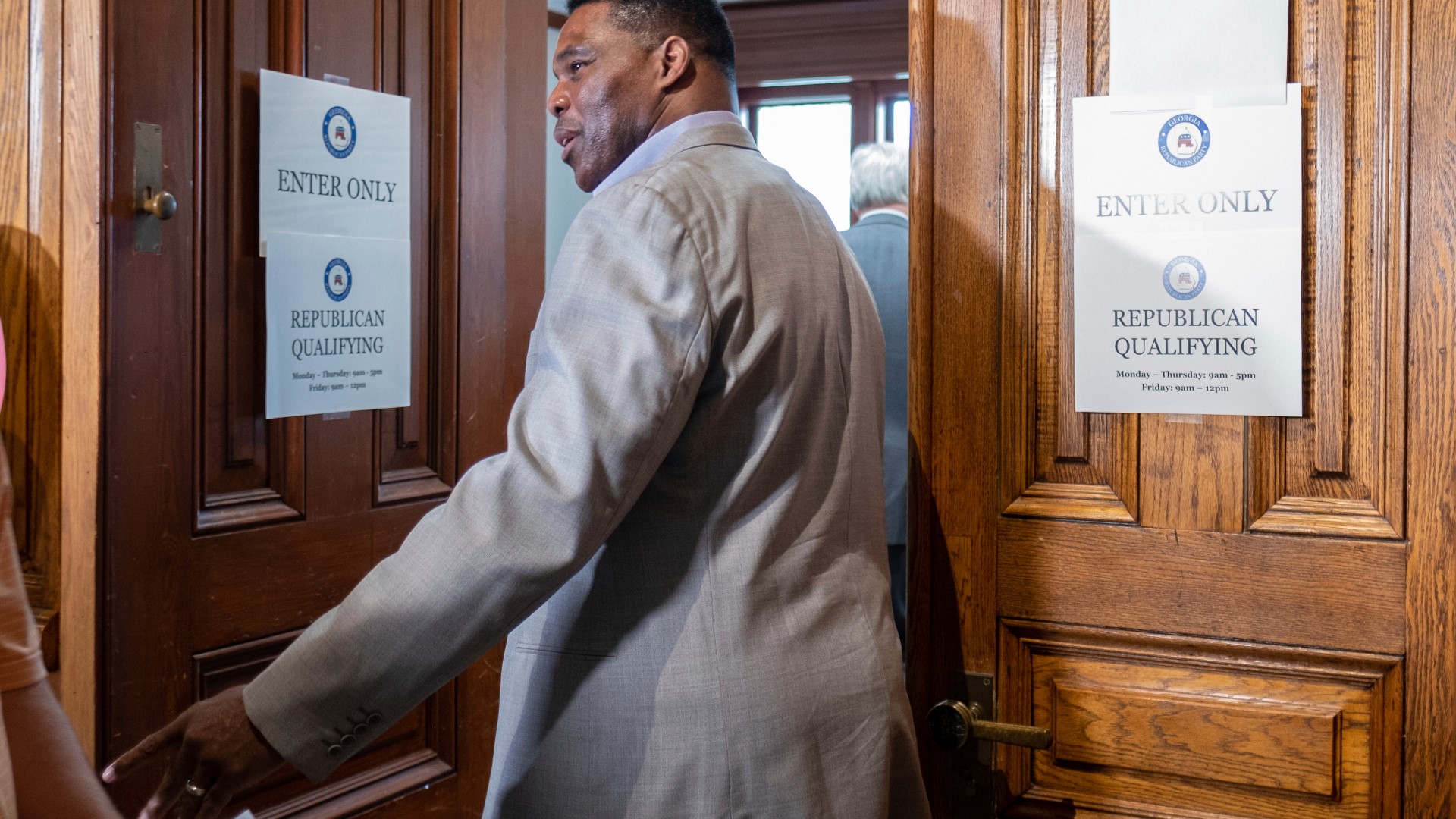 US Senate candidate Herschel Walker made a rare appearance in front of reporters Monday, moments after he qualified to run for the Republican nomination in May.