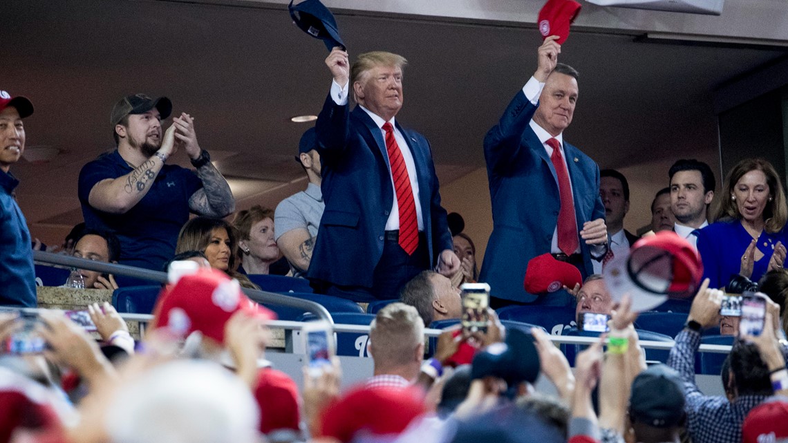 Donald Trump does tomahawk chop with Braves fans at World Series