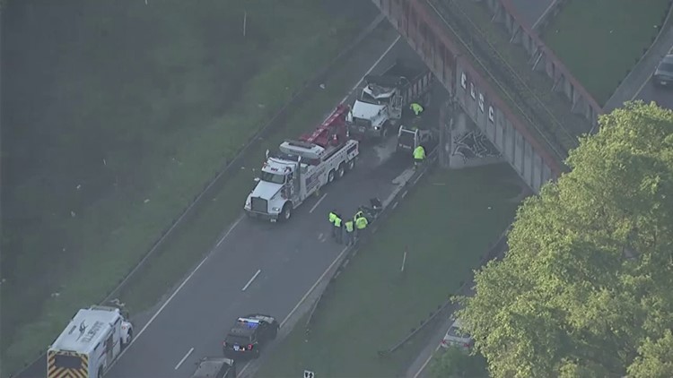 At least 1 dead when dump truck crashes into Smyrna bridge, overturns: police