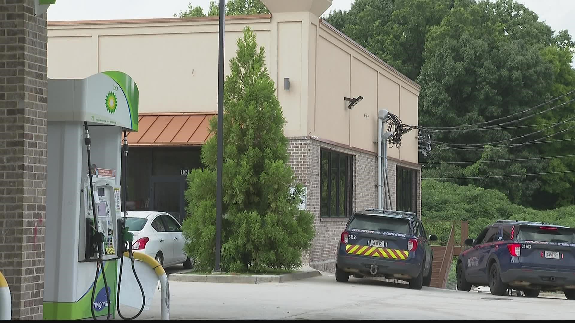 An overnight disturbance at a southwest Atlanta gas station has left a man fighting for his life.