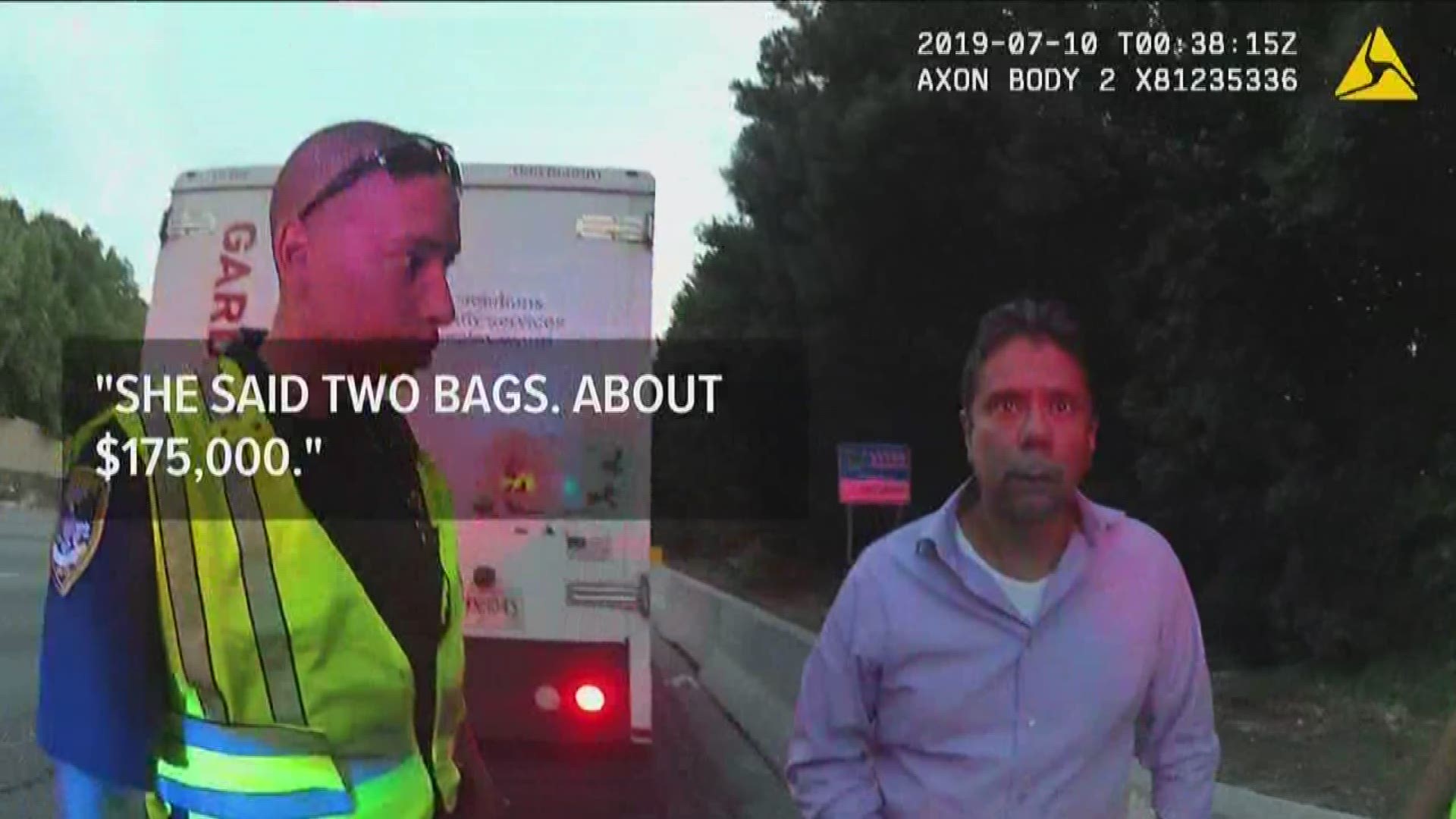 After viewing dashcam video from Dunwoody police, officers are seen explaining the situation to the general manager of the company, offering some clues as to how $175,000 spilled on I-285.