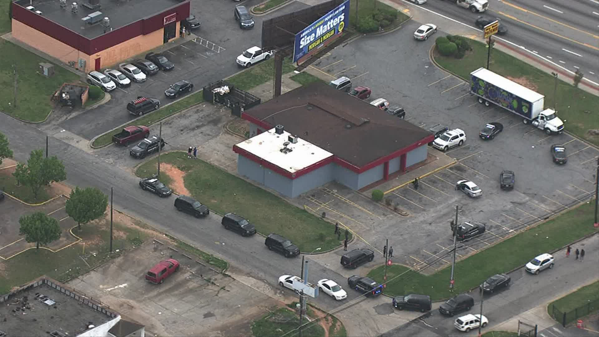 The shooting happened Thursday afternoon at the Big Man Package Store in Decatur, Georgia.