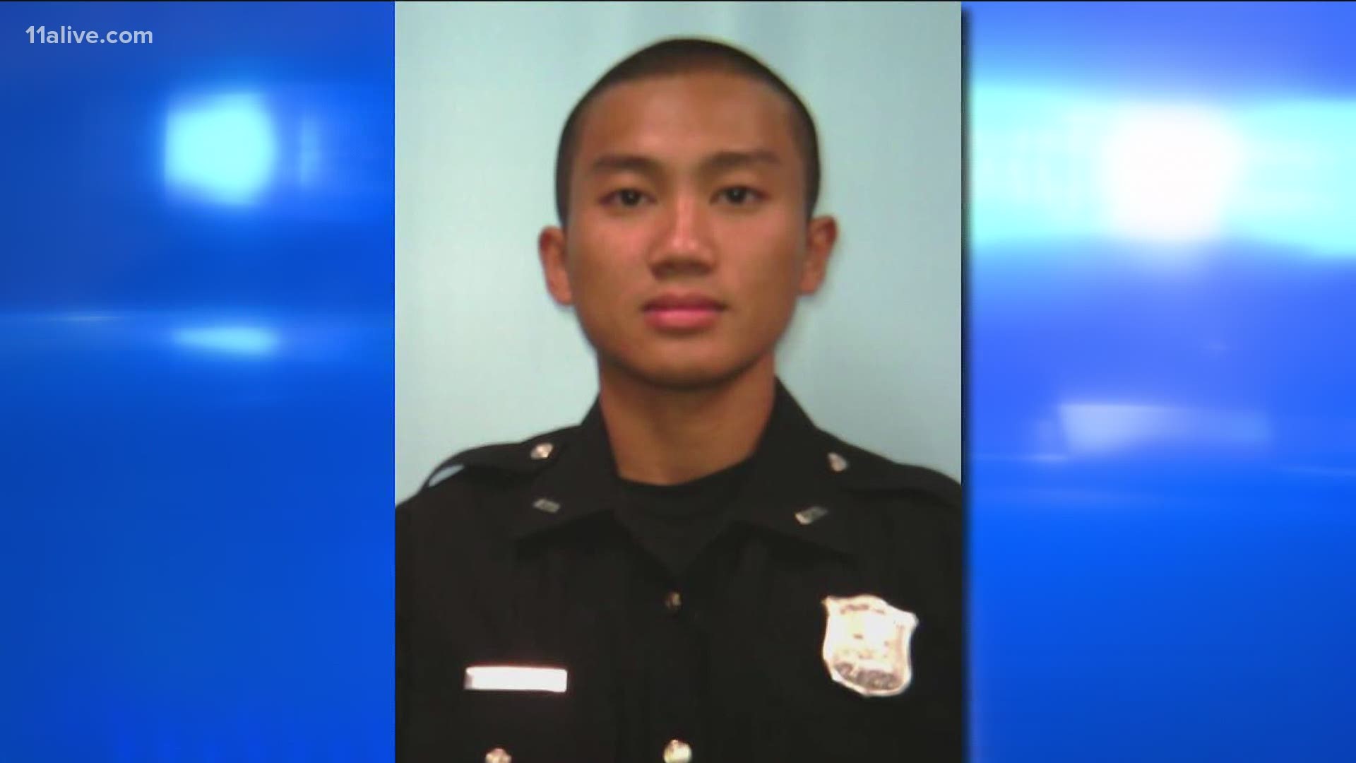 The Atlanta officer who was shot in the face exiting an elevator in a Midtown apartment building in an ambush was identified Thursday as Khuong Thai.