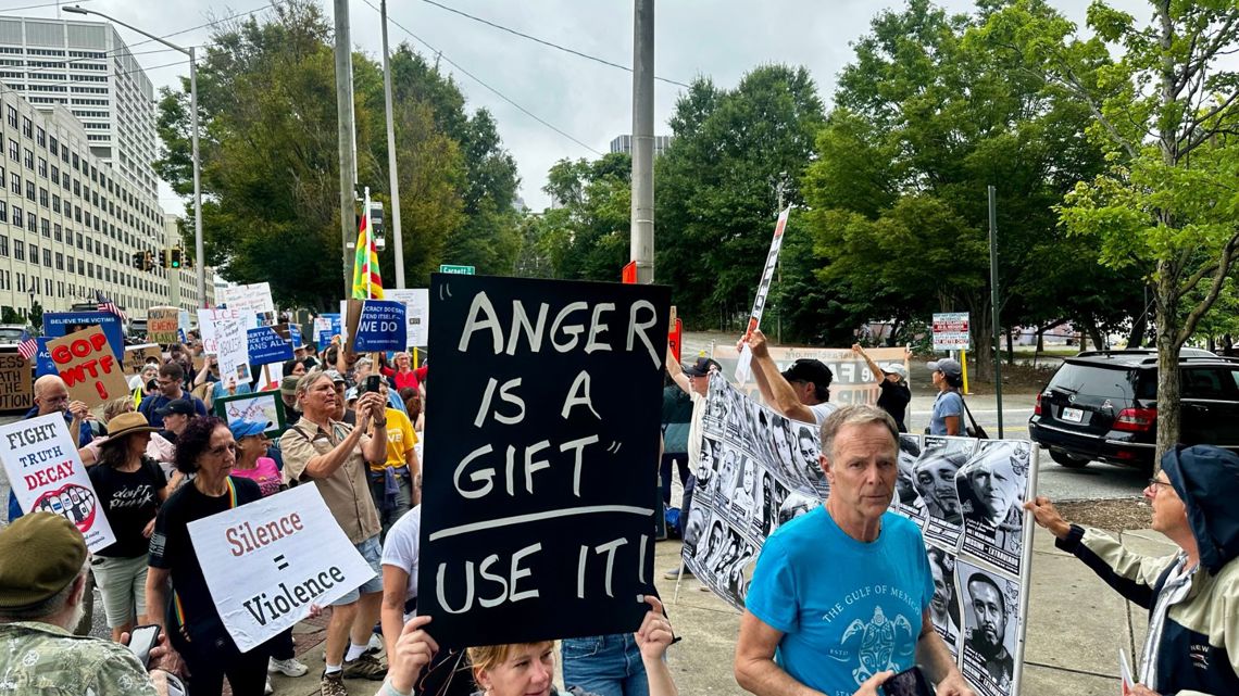 Protesters march to ICE Atlanta office in ‘Rage Against the Regime ...