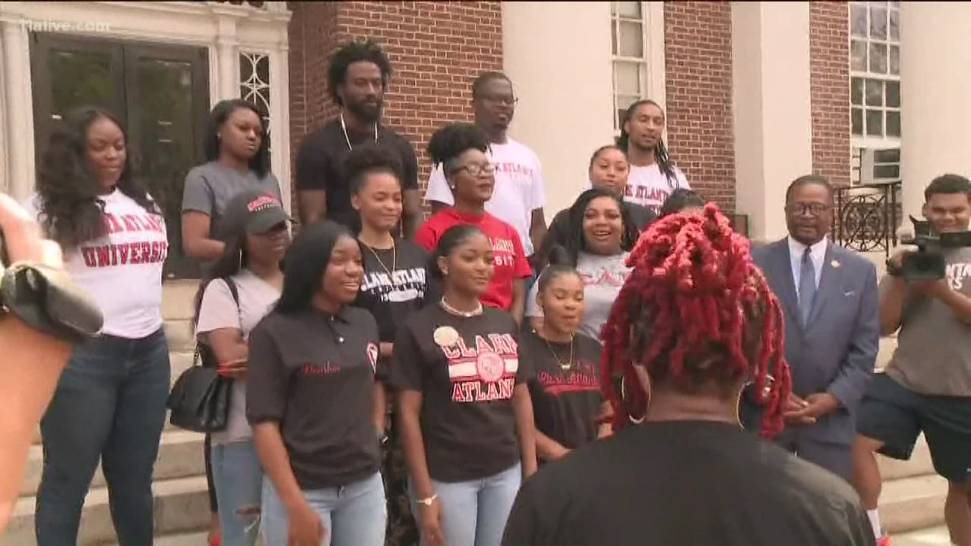 The two met with the students at Harkness Hall at Clark Atlanta on Wednesday to formally make the gift.