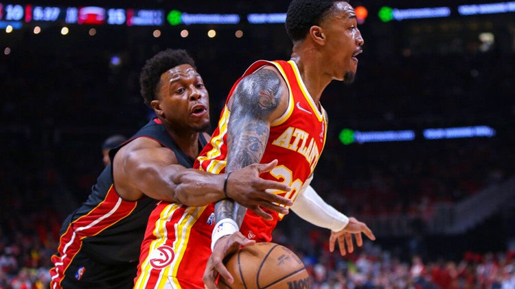 Young hits floater with 4.4 left, Hawks beat Heat 111-110
