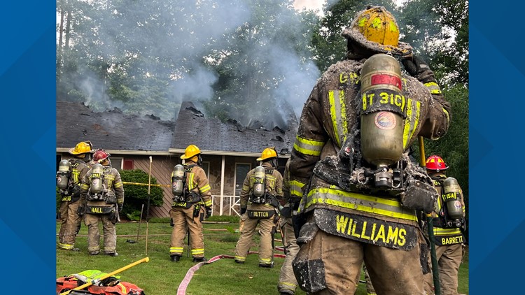 Gwinnett County firefighters battle flames at  Lawrenceville home