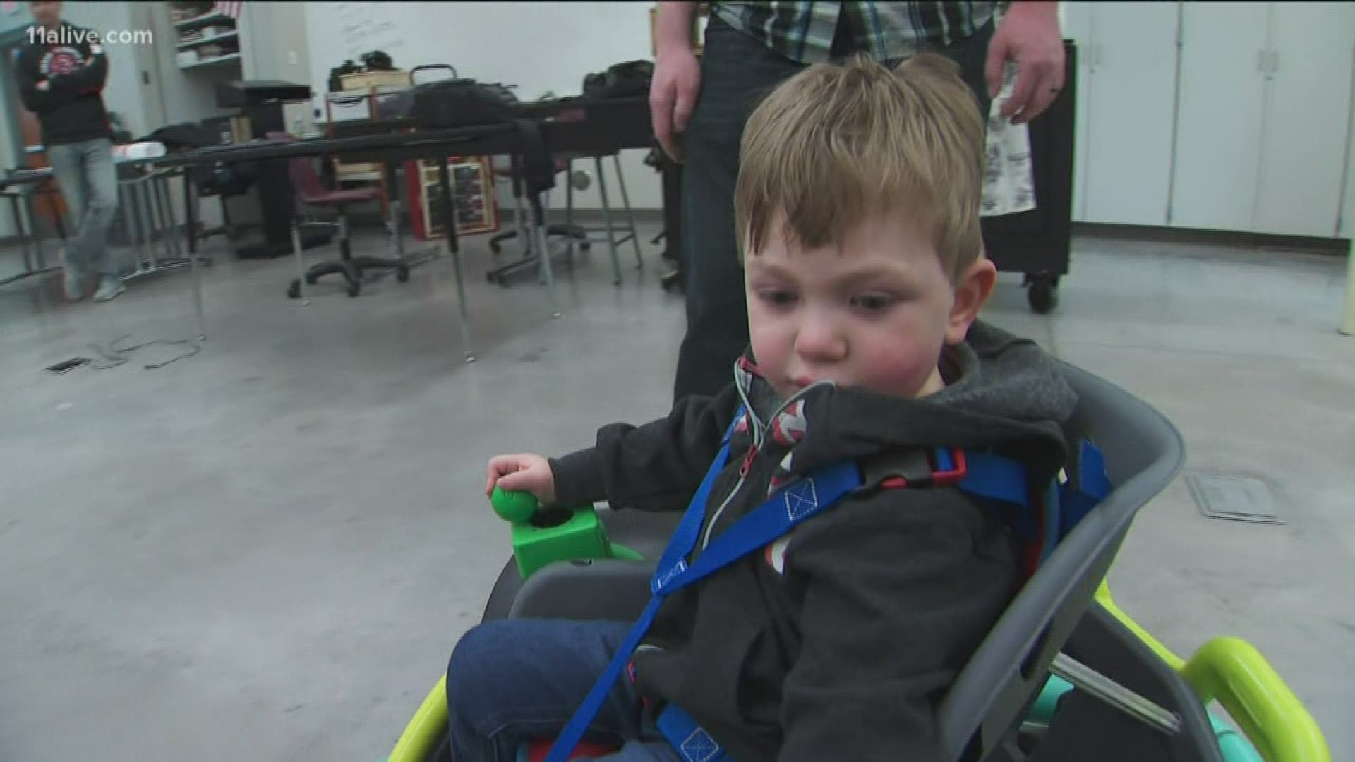 Thanks to the robotics team at Farmington High School, Cillian now has his ride – a functioning power wheelchair hand-built from a Power Wheels riding toy.