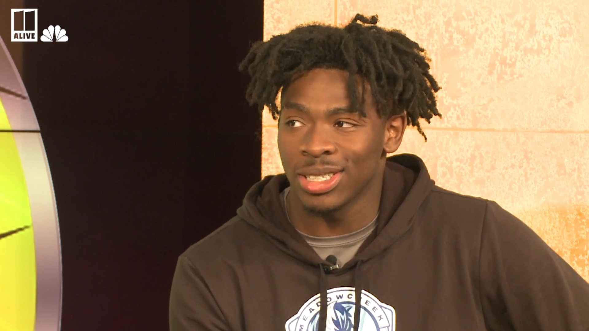 11Alive's Alex Benson talks with Meadowcreek High School running back Jordan Louie, a senior who has committed to West Virginia.
