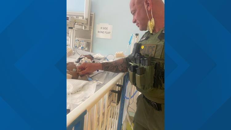 APD officer who saved 4-month-old’s life with CPR visits baby and mom at hospital