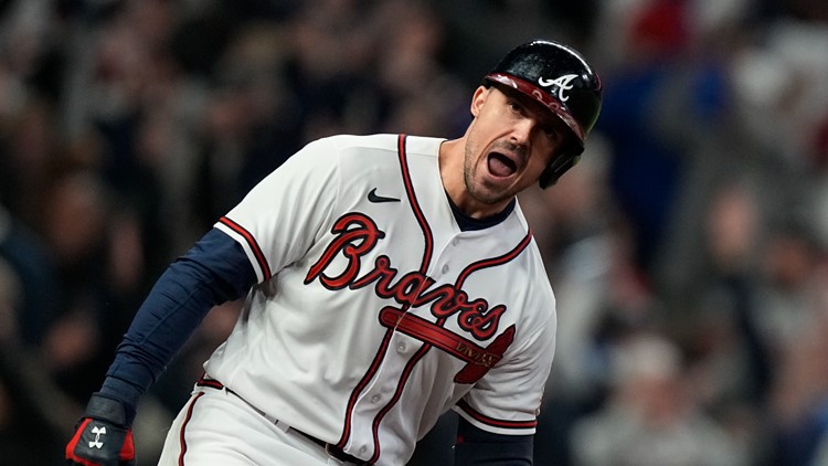 Atlanta Braves' Adam Duvall (14) swings in the second inning of a