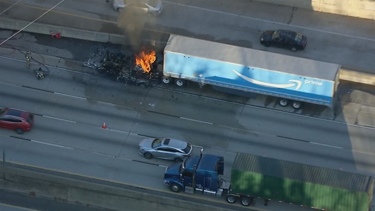 Amazon tractor trailer catches fire closing lanes on I 285 | 11alive.com