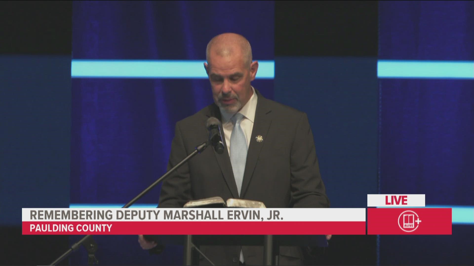 Senior Pastor Brian Bloye delivers the message for Cobb County Deputy Marshall Ervin Jr. funeral.