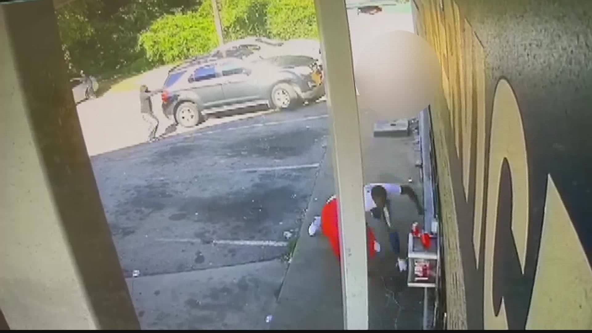 Surveillance video shows the shooting played out in a matter of seconds.