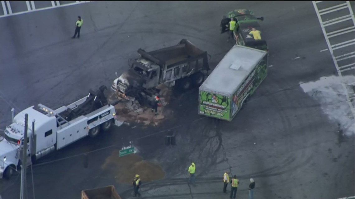 Dump truck goes up in flames after woman crashes head-on during medical ...