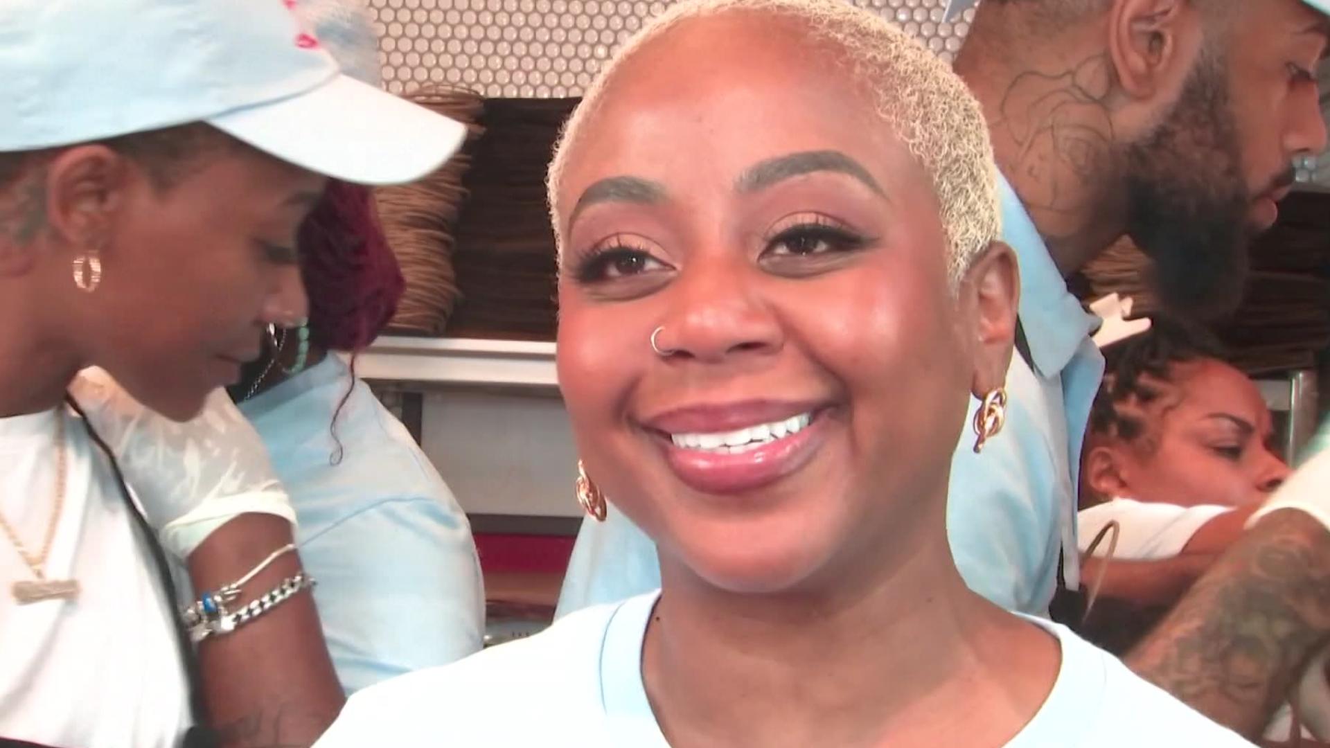 Pinky Cole spoke to news outlets on Saturday at the grand opening of Voagies in Atlanta's West View neighborhood.