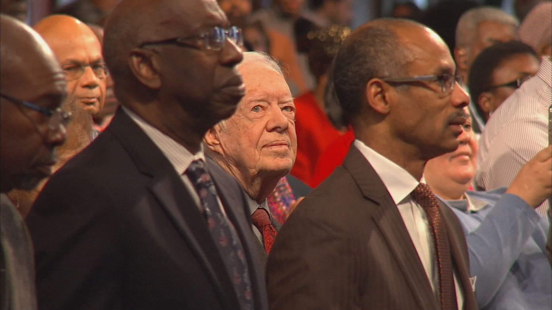 The former first family and many of their relatives were guests of honor at Atlanta's historic church on Sunday where Pastor Raphael Warnock welcomed them and told stories about their history with the church.