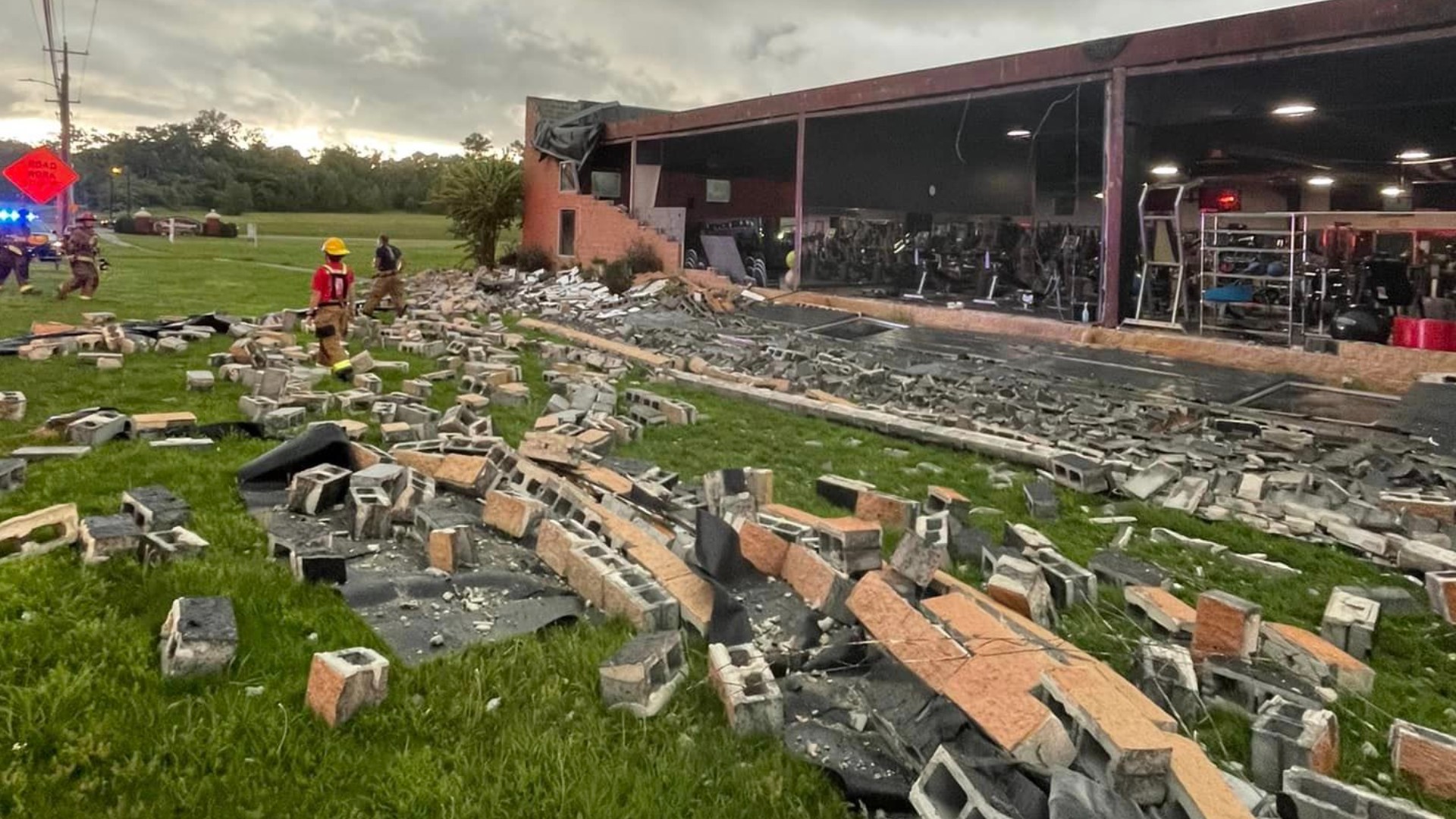 An exterior wall of a gym in Calhoun was ripped off due to strong winds and storms moving through north Georgia and the metro Thursday evening, police said.