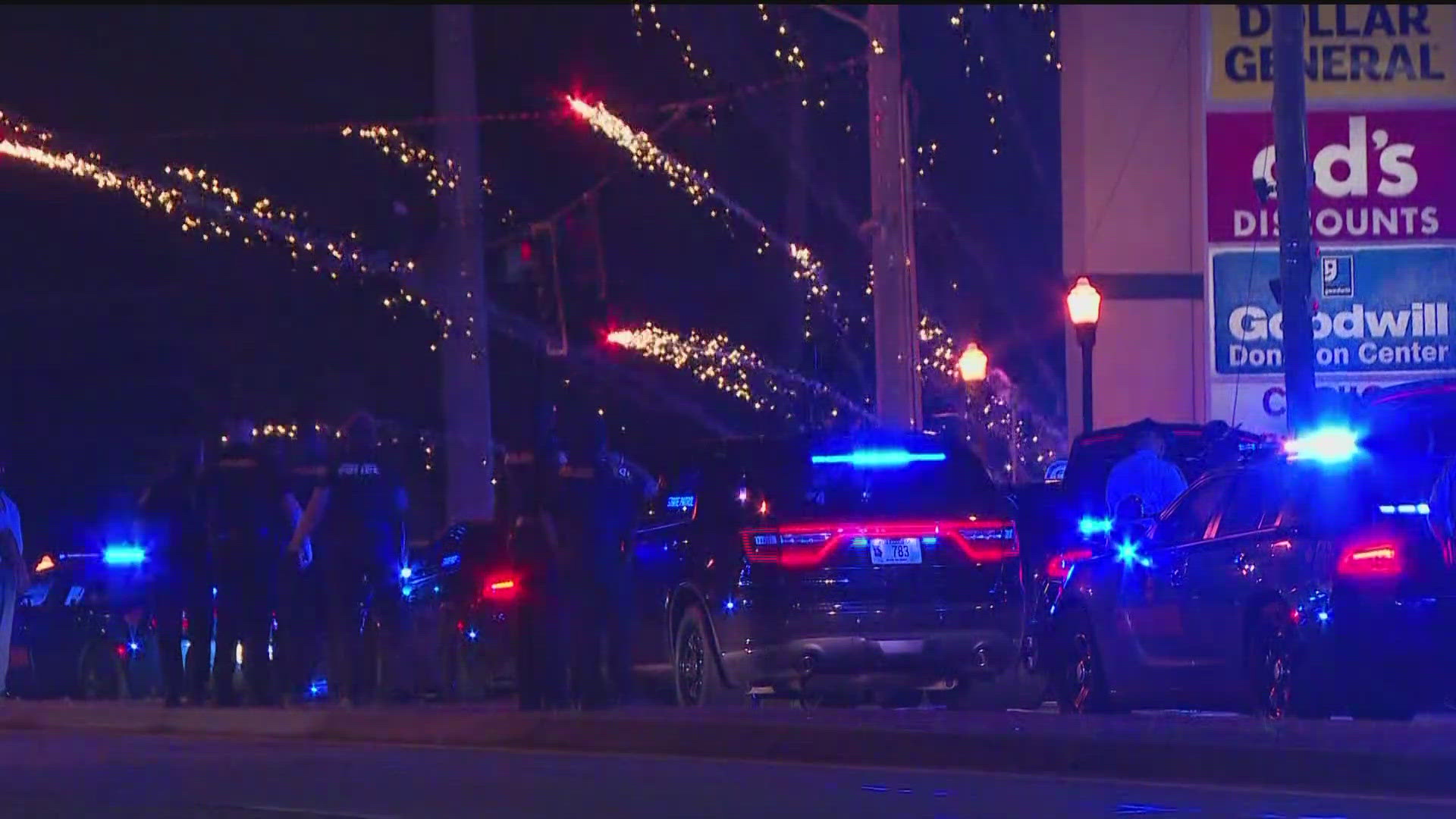 With signs in hand, people gathered in the Brookhaven community as police stood nearby to monitor the situation.