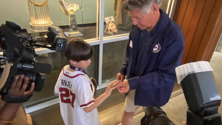 8-year-old who beat cancer hangs out with Atlanta Braves