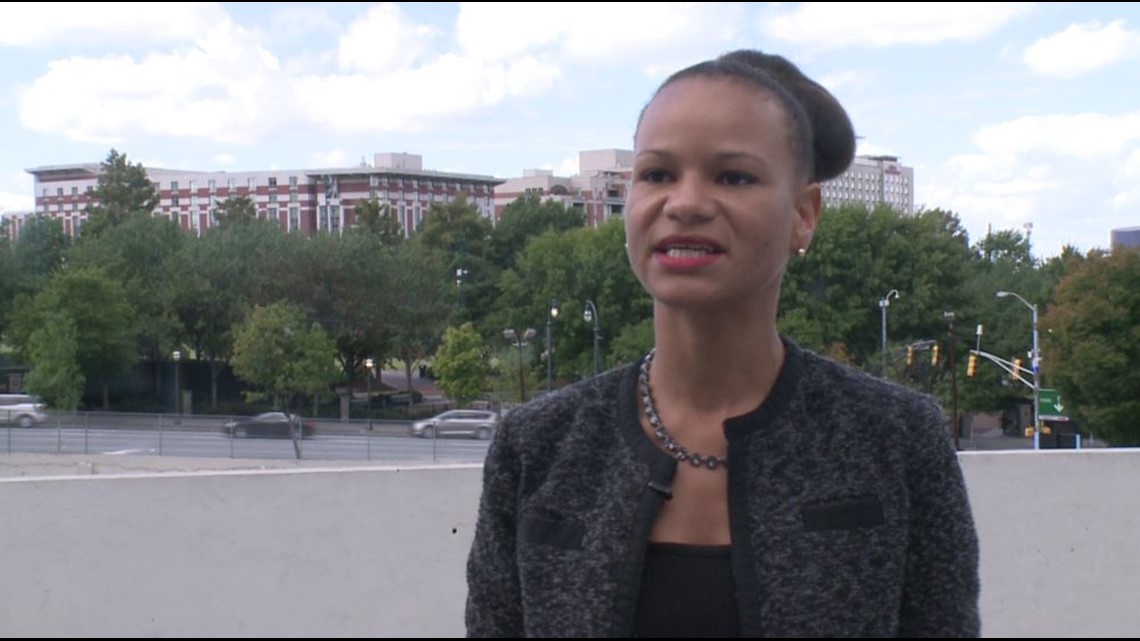 Gruesome Marietta Halloween decorations portray a decapitated Hillary Clinton