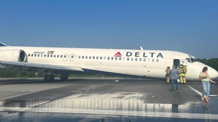 PHOTOS Delta flight from Atlanta lands safely at Charlotte