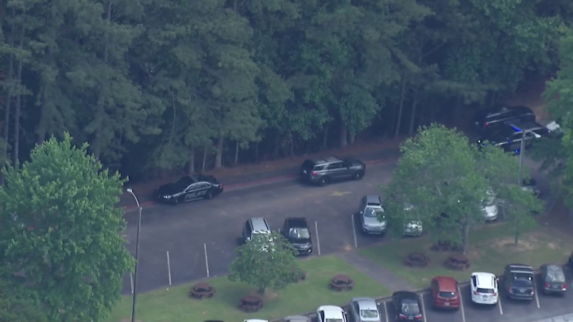 Haynes Middle School is on lockdown as Alpharetta searches for home invasion suspects in the Big Creek Greenway area.