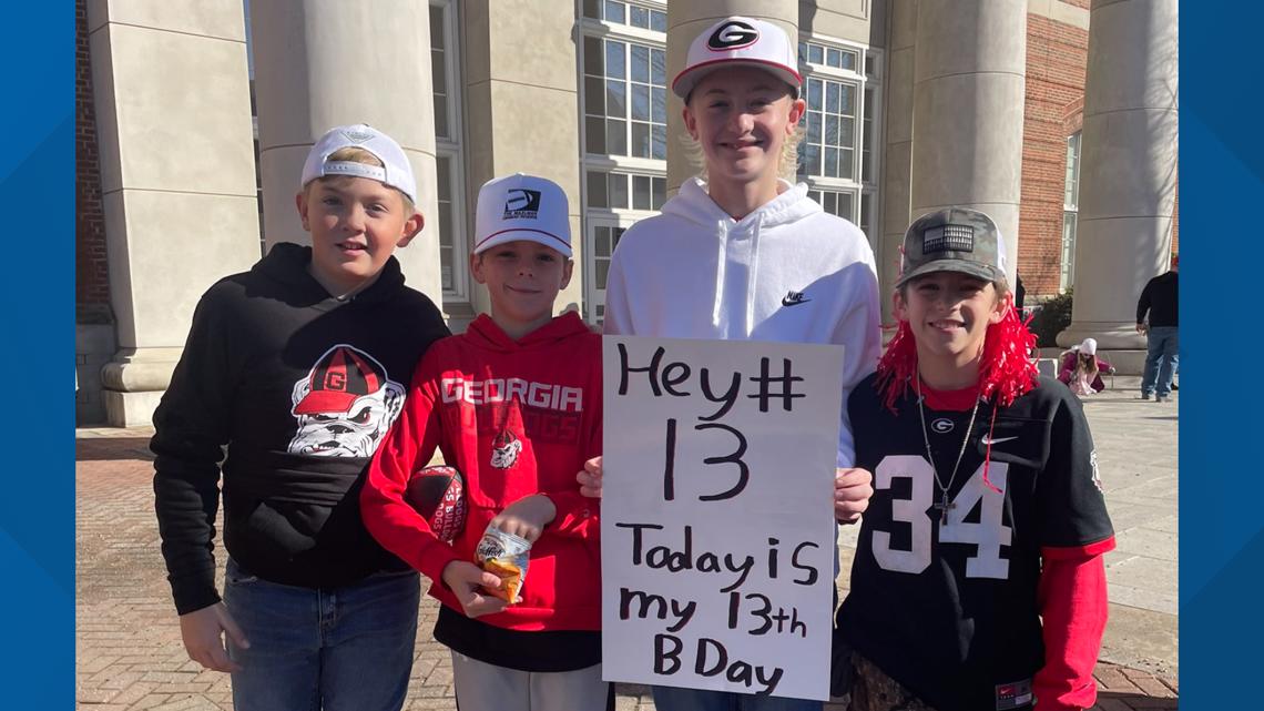 Georgia Bulldogs fans line up for rare chance at photo with championship  trophy – WSB-TV Channel 2 - Atlanta