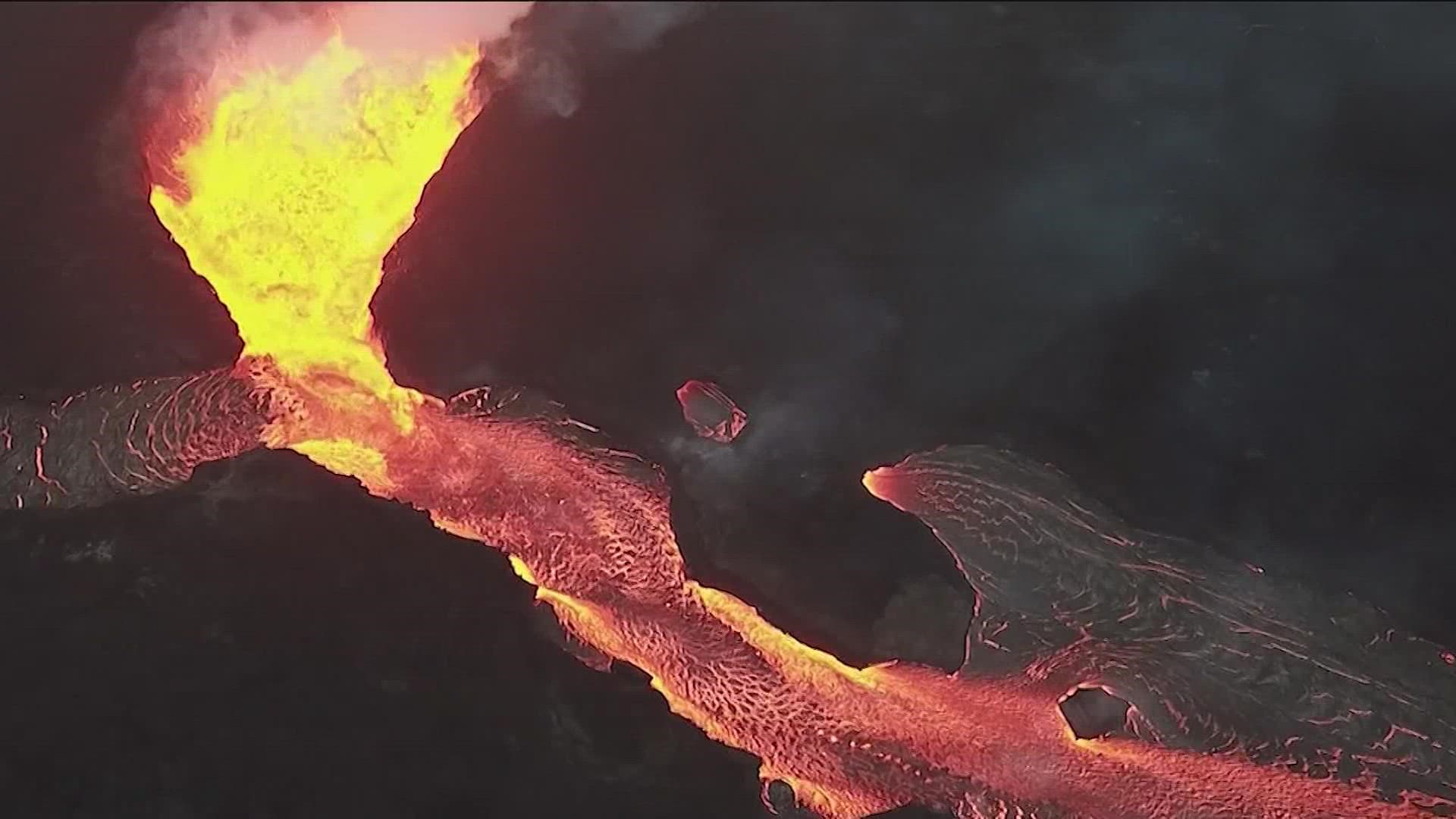 Lava is shooting 100 feet to 200 feet (30 to 60 meters) into the air as Hawaii's Mauna Loa, the world's largest active volcano, erupts for the first time in nearly 4