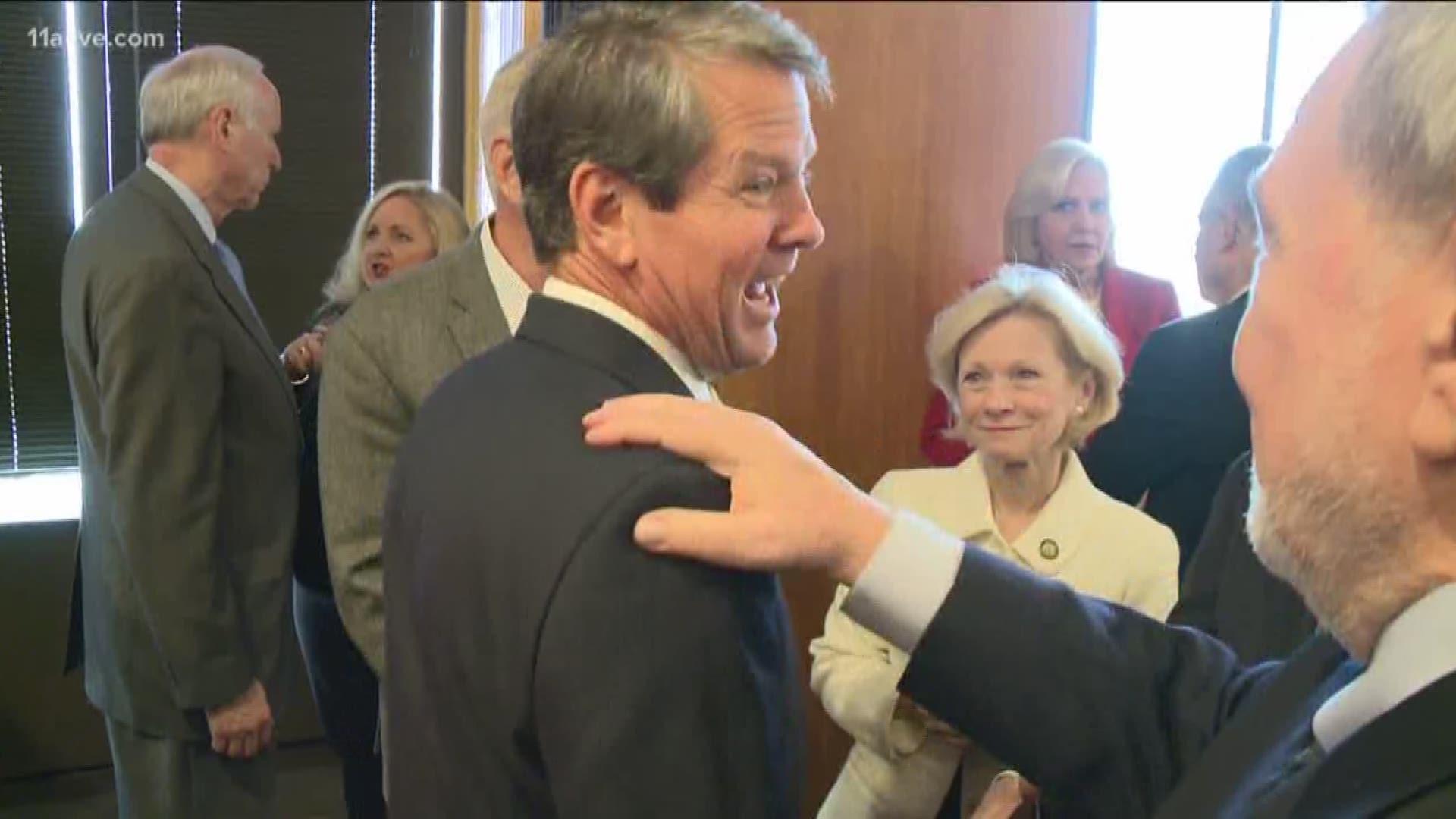 Brian Kemp spent his first full business day as Georgia's acknowledged governor-elect by introducing members of his transition team, which includes former Georgia congressman Tom Price.