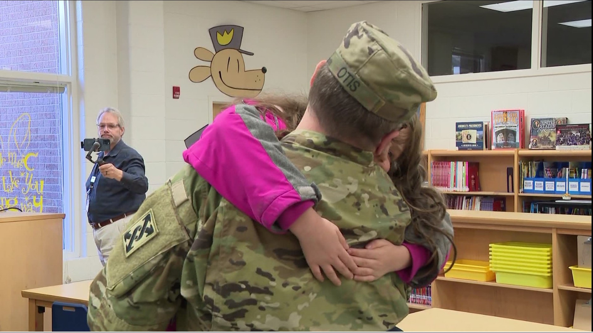 The surprise reunion took place at 8:30 a.m. at Timber Ridge Elementary School.