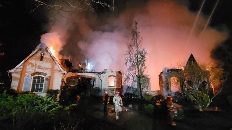 Massive home engulfed in flames at Gwinnett County country club