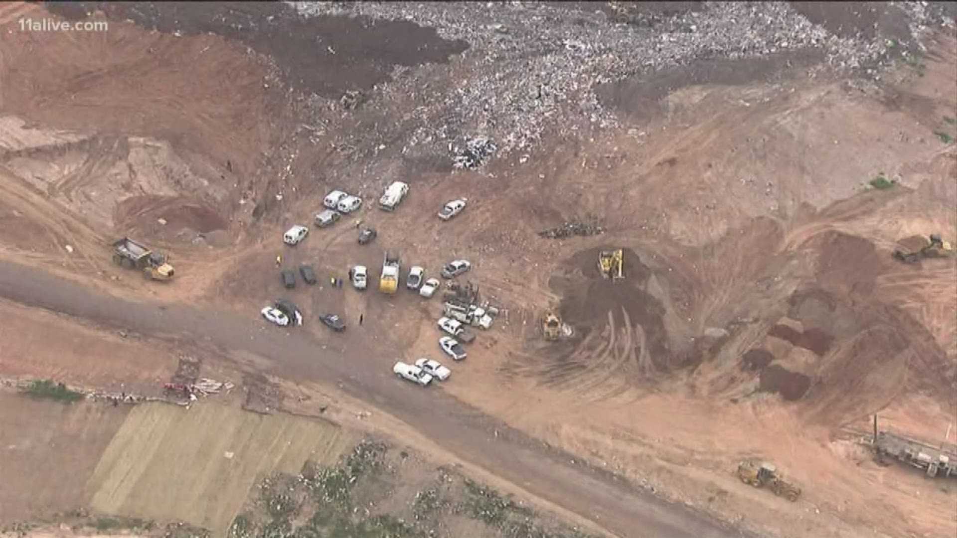 Workers discovered the body in an area where garbage trucks typically dump their loads.