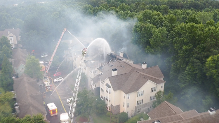 Photos: Nearly 30 families displaced after fire destroys Alpharetta apartment complex